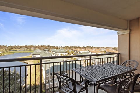 Step onto your private balcony and savor morning coffee while enjoying sweeping lake and neighborhood views that stretch to the horizon.