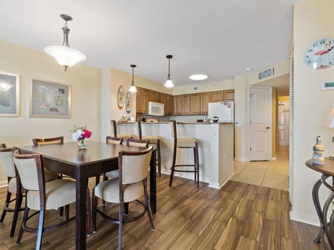 Your open dining and kitchen space blends seamlessly, perfect for sharing meals and making memories together.
