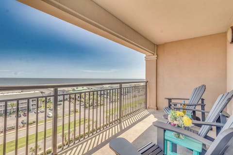 Unwind on your private oceanfront balcony with comfortable seating and endless beach views stretching to the horizon.