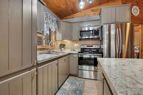 Kitchen is Fully Stocked with all needed cooking items.  Stainless Appliances 