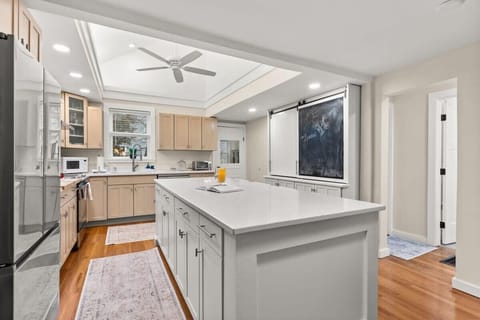 This fully equipped kitchen features stainless steel appliances, and plenty of counter space for meal preparation.