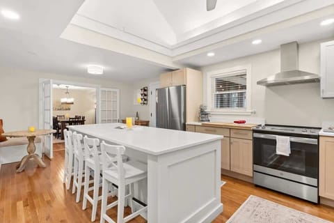 This fully equipped kitchen features stainless steel appliances, and plenty of counter space for meal preparation.