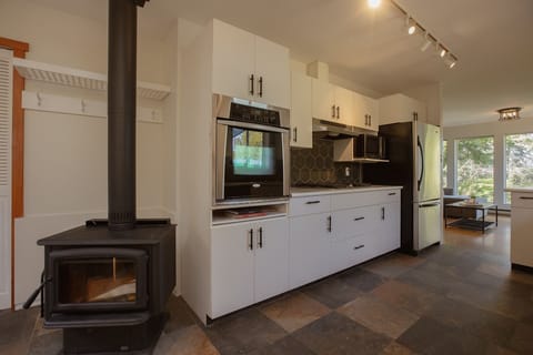 Fireplace off Kitchen