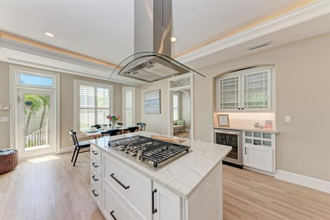 Home has a gas range in the kitchen island