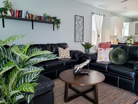 As soon as you walk in the front door you`ll be greeted by our spacious living room!