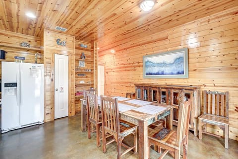 Interior - A spacious dining table perfect for enjoying meals and creating cherished memories with loved ones