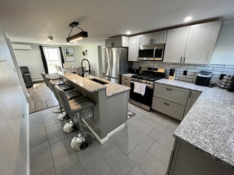 Kitchen comes fully stocked with all essentials. Gas stove, double side fridge, dishwasher, Keurig machine, etc.