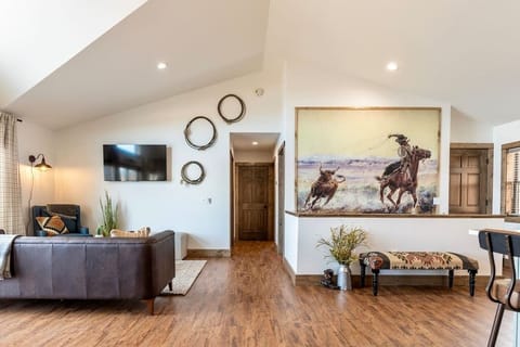 Gather all your friends and family in the upstairs living, dining and kitchen area.