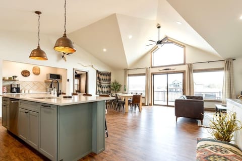 Walk in and feel at home with this open concept kitchen, dining and living space.