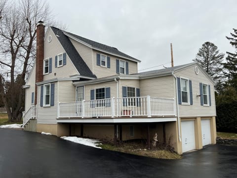 The deck is off the small twin bedroom.