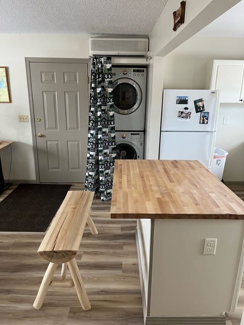 Full Sized LG Stacked Washer and Dryer.