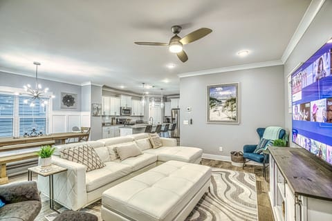 Large sectional couch in the family room, big screen TV