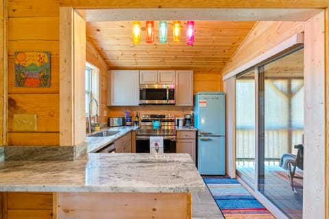 The kitchen is a full kitchen with everything to make a great meal and dine in!