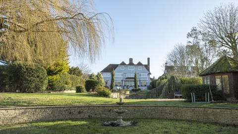 Back view of house from middle of the extensive garden 