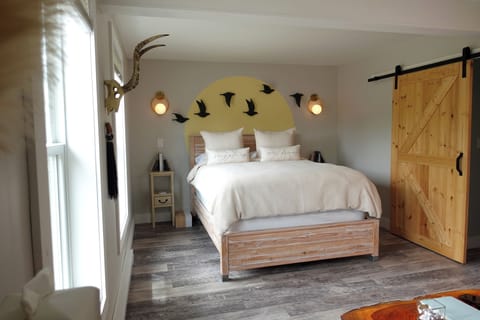 Uplifted, plush, upper floor apartment inspired by living in the clouds.