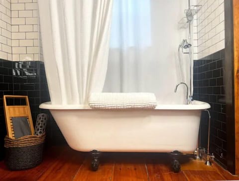 Bathroom feature: an antique clawfoot tub perfect for soaking after your ADK day