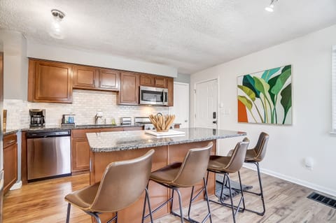 Fully stocked, eat-in, chef’s kitchen with Viking range