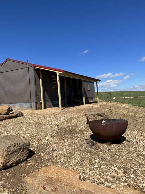 Front of Cabin with Fire Pit