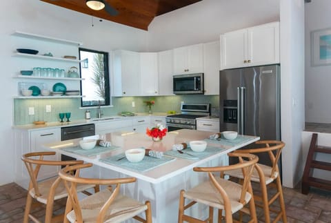 Renovated modern kitchen with breakfast bar and brand new appliances