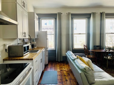 Galley kitchen is fully stocked 