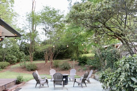 Wood burning fire pit area with string lights
