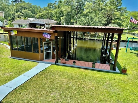 Gnat screened boathouse and double wide covered boat slips