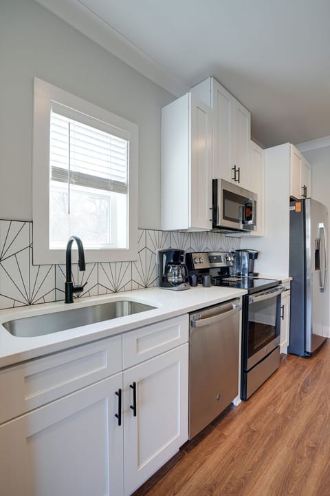 Fully stocked kitchen with all basic cooking essentials.