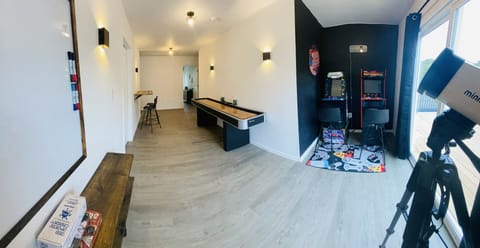 Game Room with a Shuffle Board Table, 2 Arcade games , Board Games & Telescope