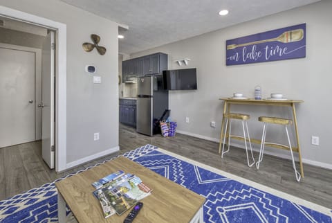 Game basket and extra pool towels under the TV!