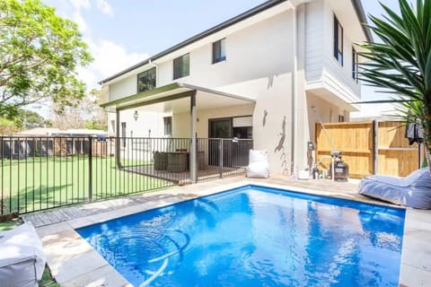 Enjoy the pool and the greenspace