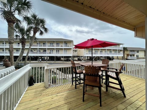 Your private deck offers the perfect spot for morning coffee or evening cocktails under swaying palms.
