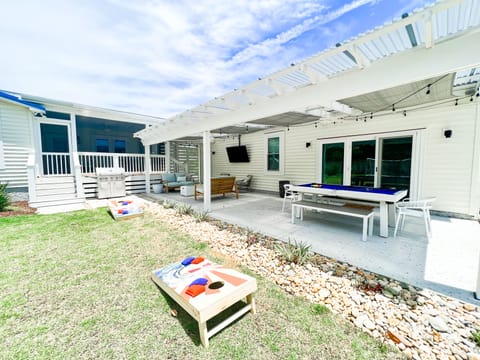 Unwind on the patio after a fun day at the beach. 