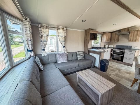 This inviting space makes our dog-friendly caravan the ideal retreat for unwinding together.