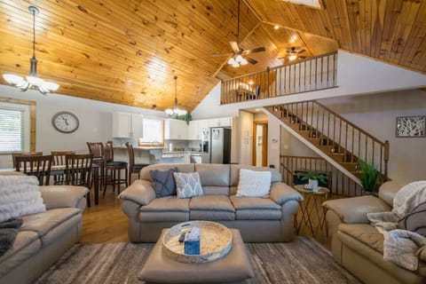 The dining table, the kitchen and the living room; your comfort and relaxation in one photo.