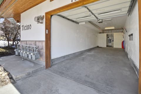 The home is complete with a stacked 2 car garage as well as parking for one additional vehicle on the driveway