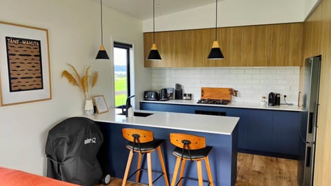 Full kitchen available with gas hob/oven, microwave, toaster, jug & Nespresso.