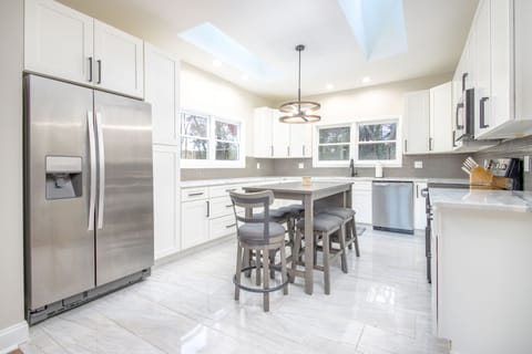 Newly renovated kitchen with island and seating for 5