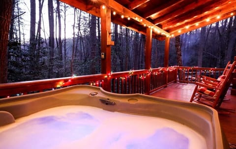 Enjoy a blissful soak in our private hot tub with serene views of nature to keep you company.