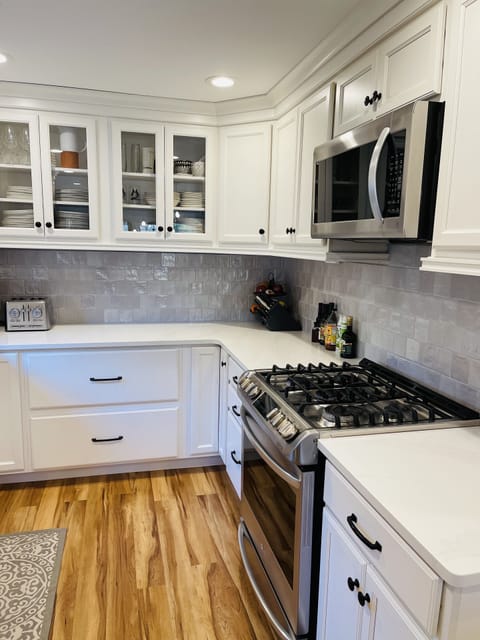 New gas stove and plenty of prep spaces