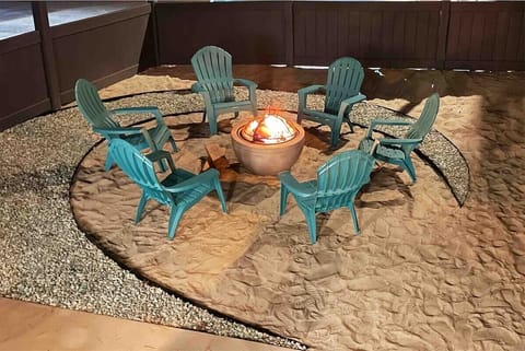 Sand pit is complete with fire pit and chairs for the bonfire experience. When you arrive, there is a tarp covering this area to keep it nice for use. Chairs and pit are on the side of the house. We're always happy to help set up!