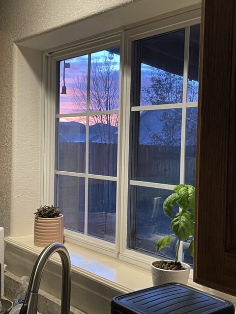 You can watch sunrise over the Midland Hills from the kitchen window.