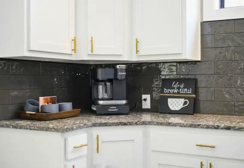 Enjoy the little touches that make our kitchen feel like home, including a dedicated area for your coffee rituals.