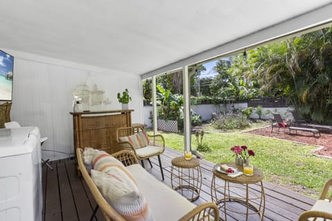 beautiful patio, where you'll discover a charming outside dining area perfect for enjoying hearty shared meals with family or engaging in a good conversation with friends. also offers sun loungers and hammocks!