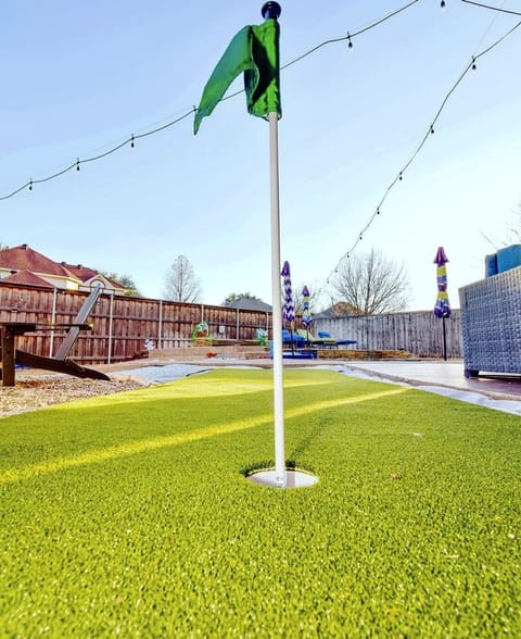 Practice your hole in one with our putting green