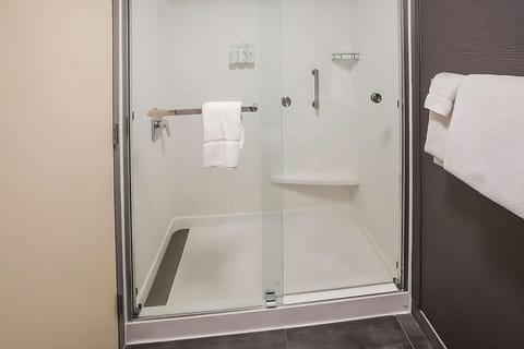 Full bathroom with a shower. Basic toiletries and towels are provided
