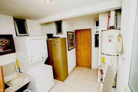 The kitchen is equipped with a washer and dryer for your convenience
