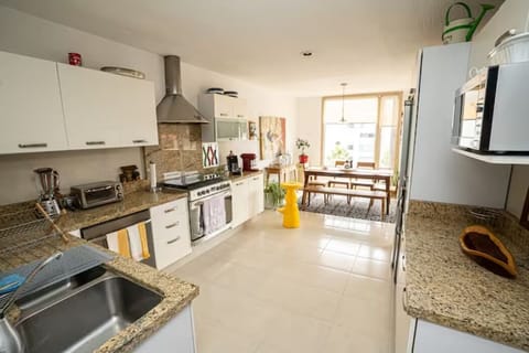 Our sleek and stylish kitchen is perfect for whipping up a quick snack 