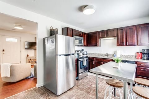 The Kitchen is off of the living room.