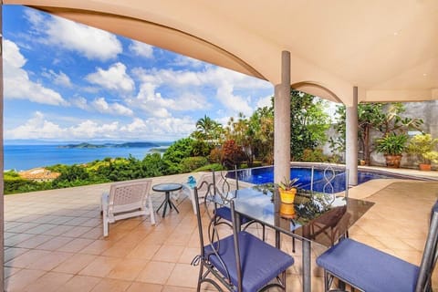 Casa Om offers a massive, shaded terrace with stunning ocean views of the Playa Hermosa and the Papagayo Peninsula.  