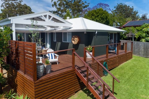 Outdoor dining and deck space, plus loads of grass for the kids